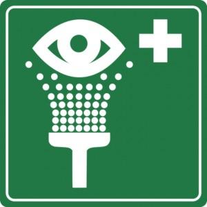a green and white pictogram an eye and a shower and a first aid cross indicating an emergency eyewash location